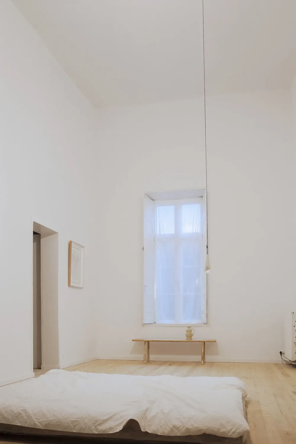 A Trame room: four-metre ceilings, inside shutters.